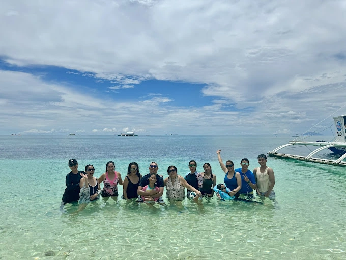 Malapascua Beach besided Malapascua Budget Inn Rooms by Samuel Jr Macasil