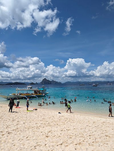 Tourists in Seven Commandos Beach by Hong Taing