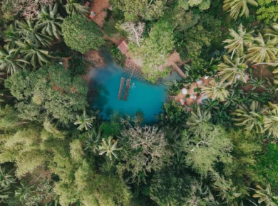 birds-eye view of blue hole in tuburan by Gho Go