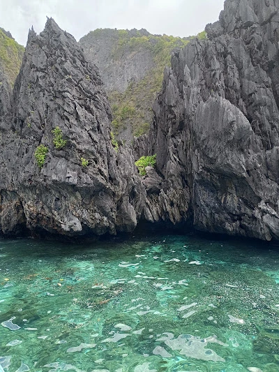 towering stones in Secret Lagoon by Kristína Benediková